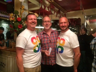 two members of the coop lgbt team  with a member from mindout