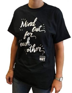 figure wearing black tshirt with white logo reading "mindout for each other"