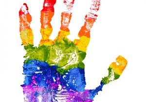 A handprint in rainbow paint colours